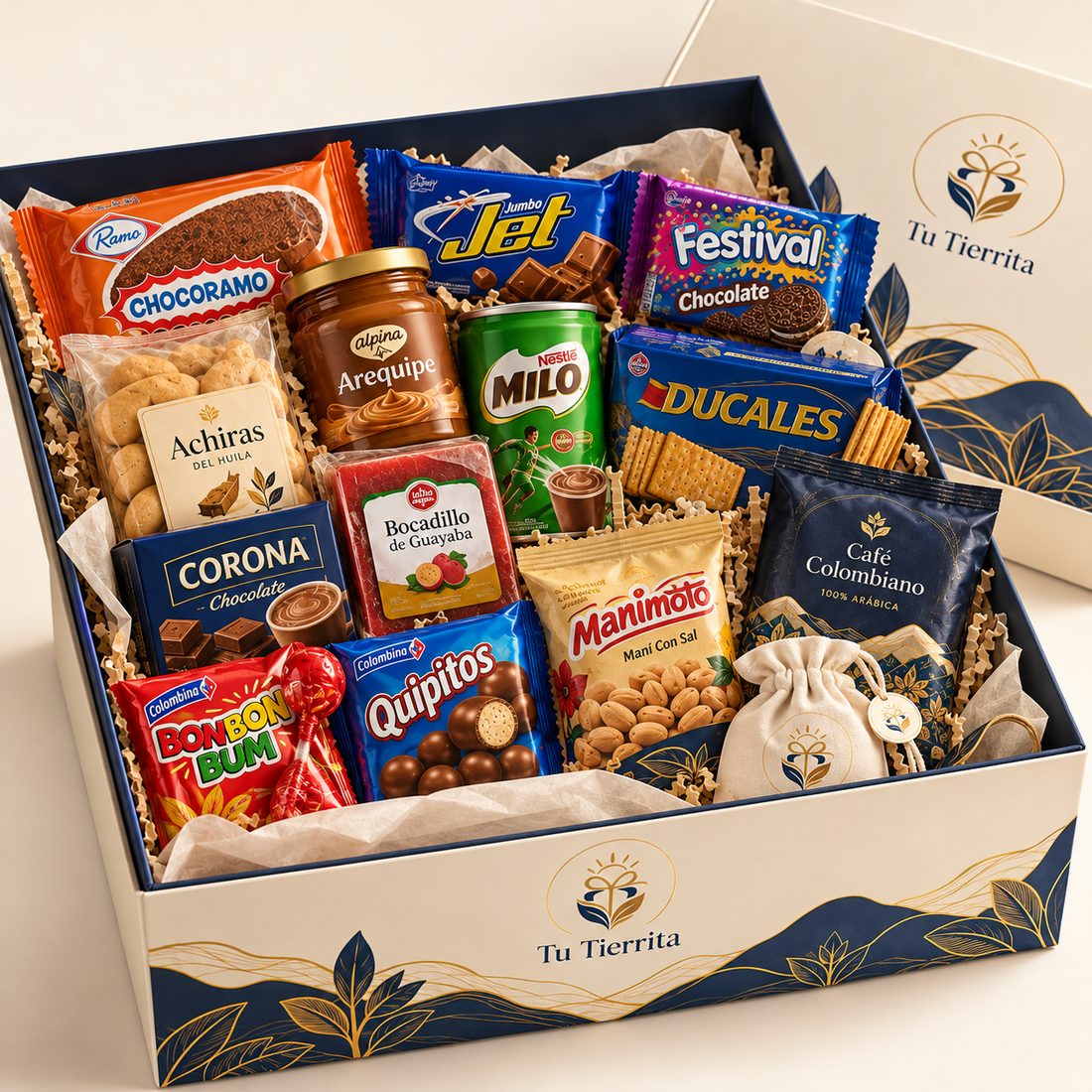 Caja Tu Tierrita abierta con dulces, galletas, arequipe y café colombianos
